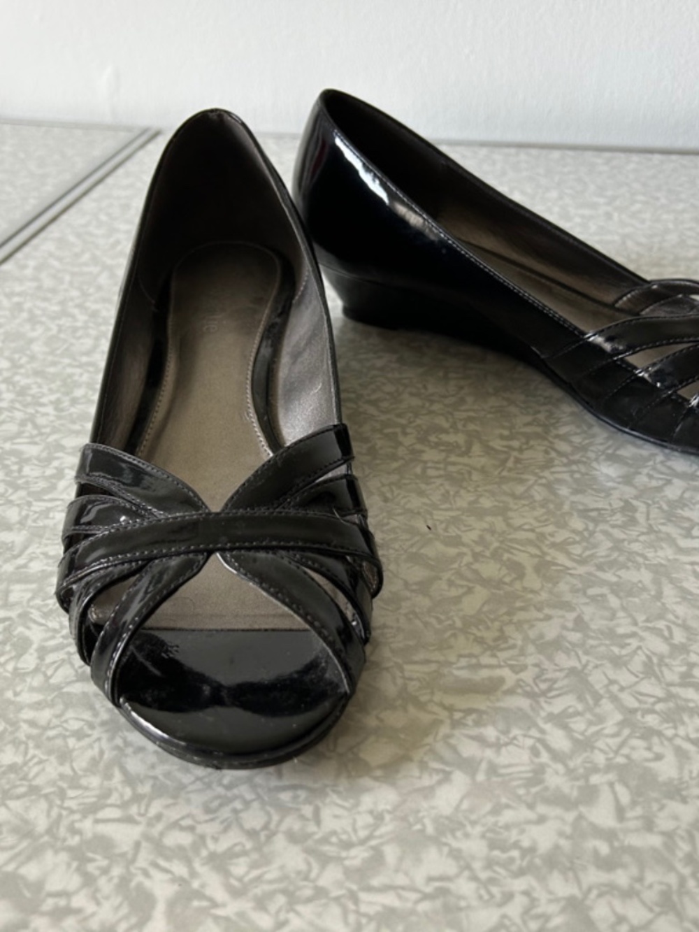Black patent leather wedges